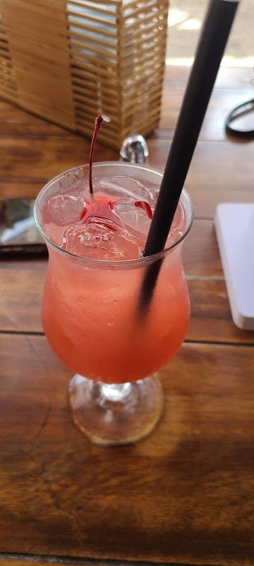 Carlitos Aruba dining patio outdoor seating Palm Beach atmosphere