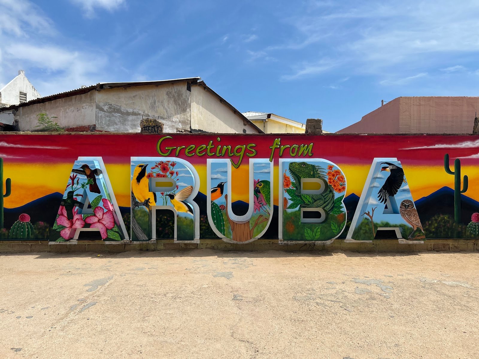 The Greetings from Aruba mural on a wall in San Nicolas, Aruba