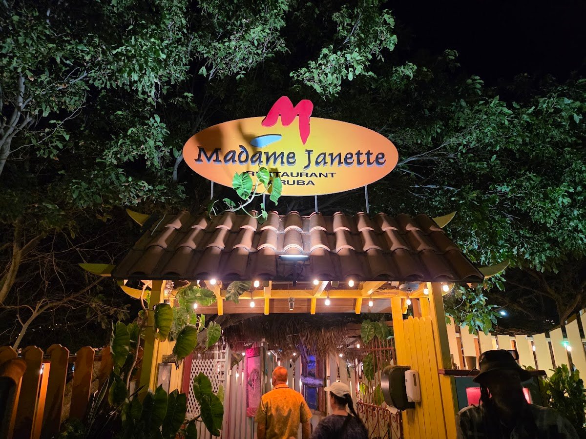 Madame Janette Aruba signature dish — Almond-Crusted Grouper or similar plated entree