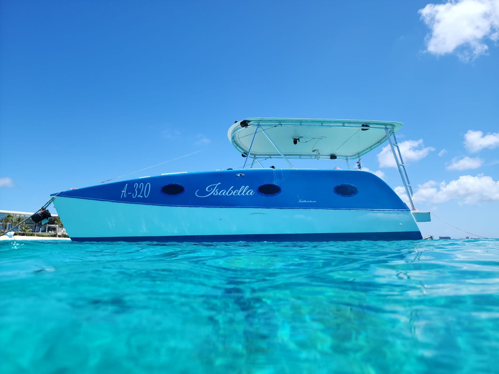 Guests on deck during a private catamaran charter in Aruba