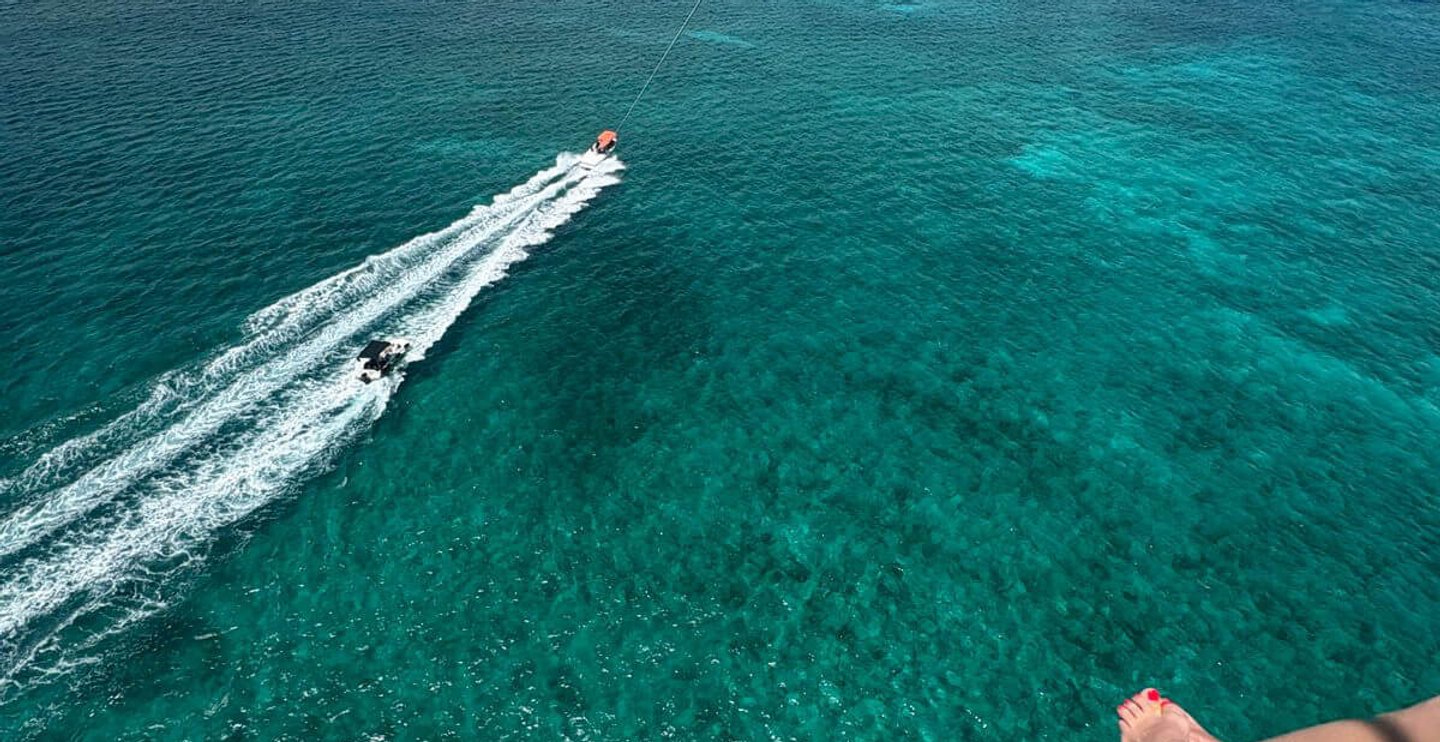 Skyview Watersports parasailing boat departing Palm Beach Aruba