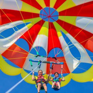 Parasailing high above the turquoise water of Palm Beach, Aruba
