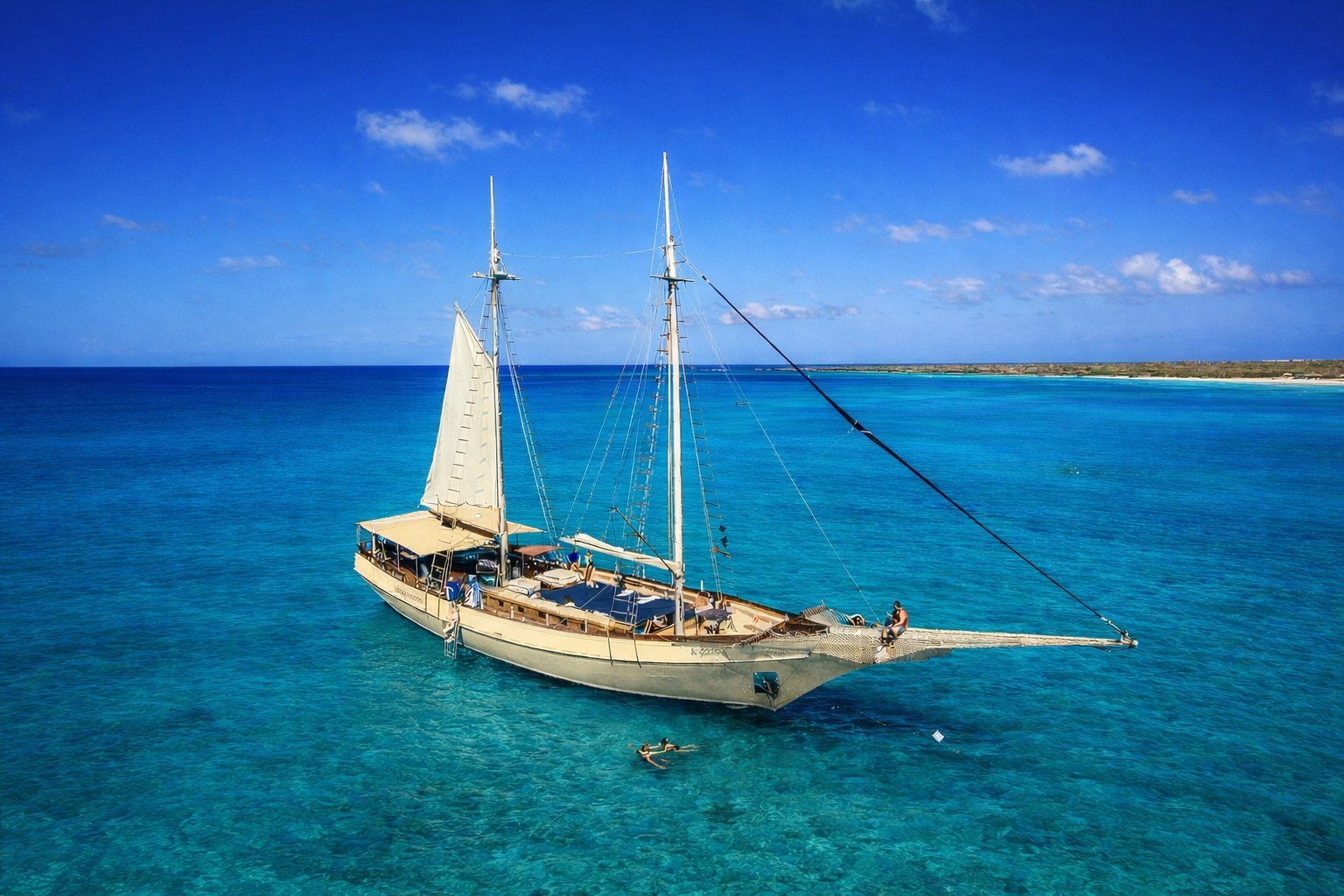 Flagship Aruba schooner at anchor in turquoise water