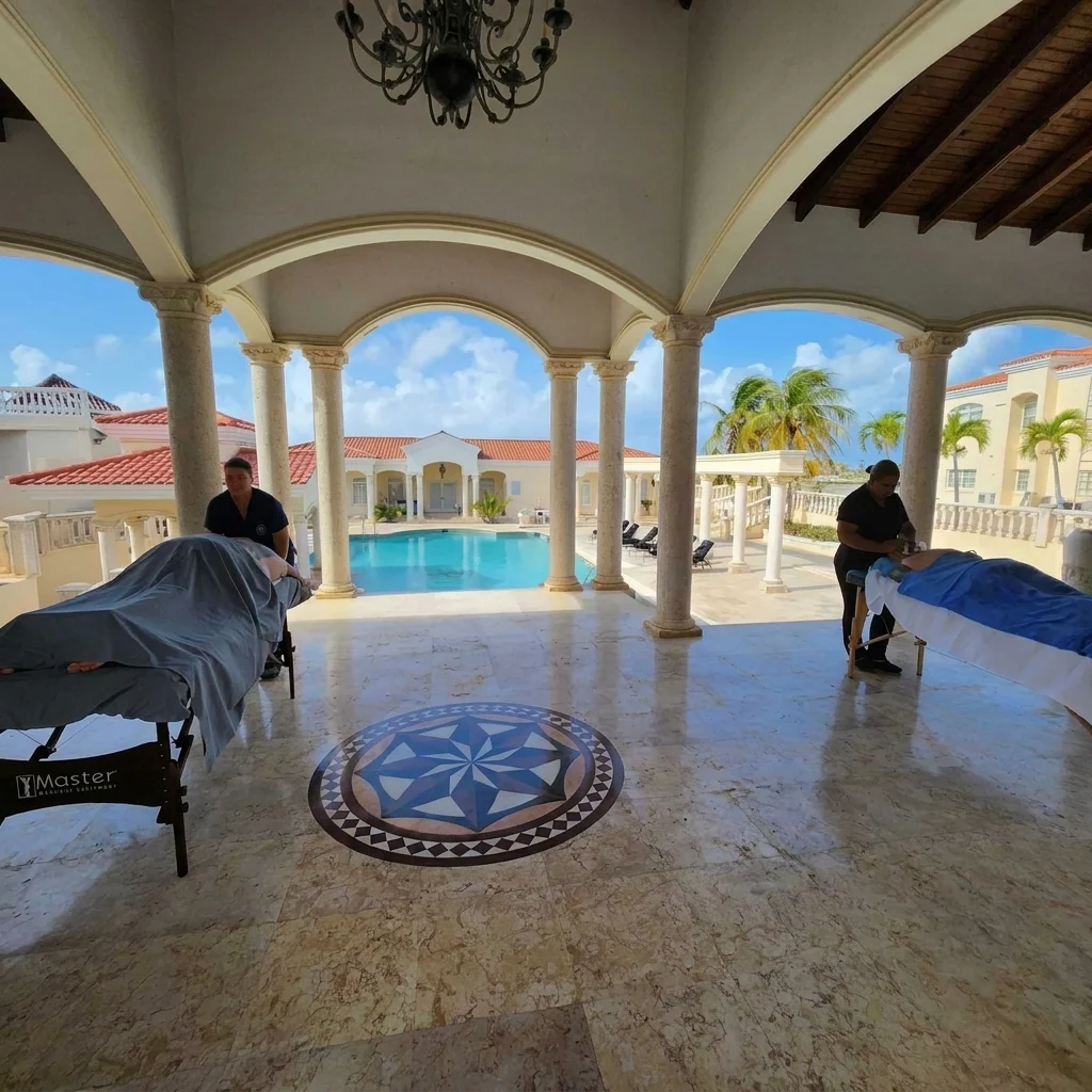 Ocean Reset massage beside a villa pool in Aruba