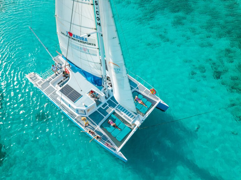 Guests on deck during a catamaran snorkel cruise in Aruba