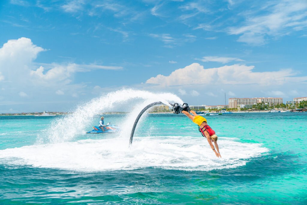 Flyboard rider above the water at Palm Beach, Aruba