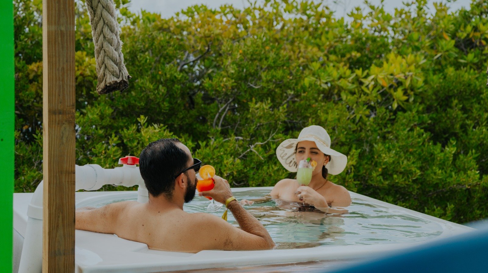 Guests enjoying the saltwater jacuzzi on a private island in Aruba